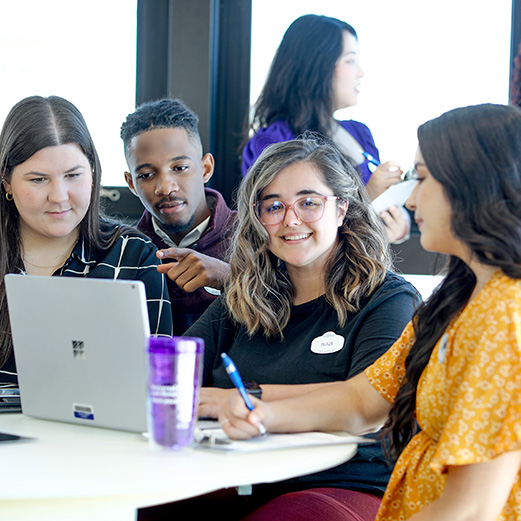 Diverse group of college interns