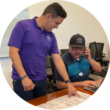 Two Administrative Team Members collaborating on a project at Universal Creative