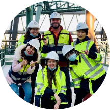 Team Member at desk working on small circuit board