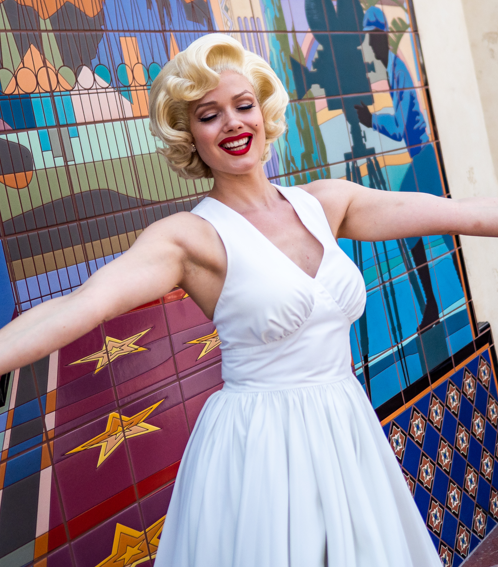 Costumed actress portrays the likeness of Marilyn Monroe from the movie The Seven Year Itch