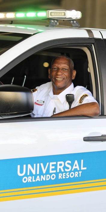 Security Team Member sitting inside a Universal Orlando Resort security vehicle