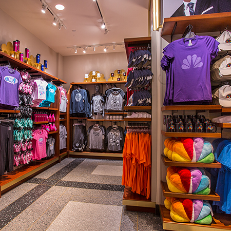 Colorful souvenir merchandise neatly arranged inside the Universal Studios store