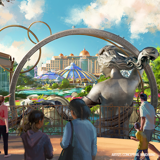 Gold Compass with dark blue center. Text Universal Epic Universe appears on top of it.