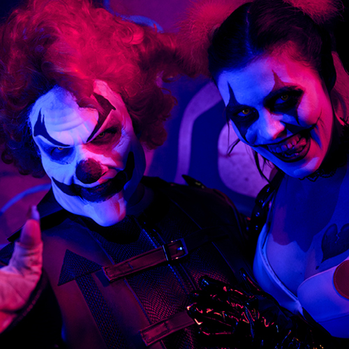 Two clown scare actors posing