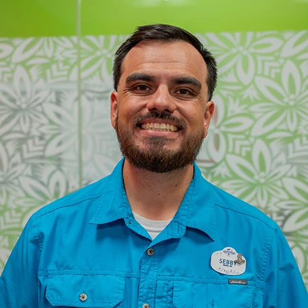 Water Quality Manager, Sebby, looking at the camera and smiling