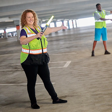 Parking Manager guiding traffic in the CityWalk parking garage